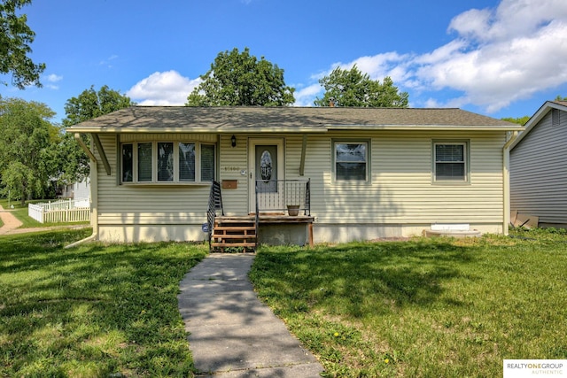 12180 Pedersen Dr, Omaha, NE 68144 - view of front facade with a front yard