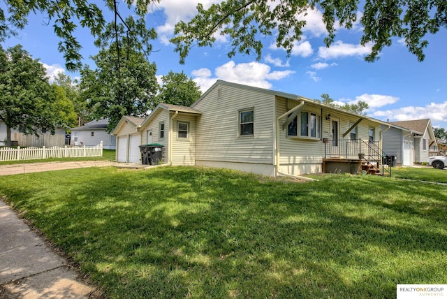 12180 Pedersen Dr, Omaha, NE 68144 - view of property exterior featuring driveway and a garage
