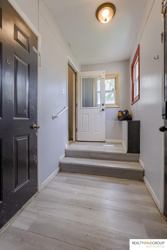 12180 Pedersen Dr, Omaha, NE 68144 - foyer entrance with wood finished floors and baseboards