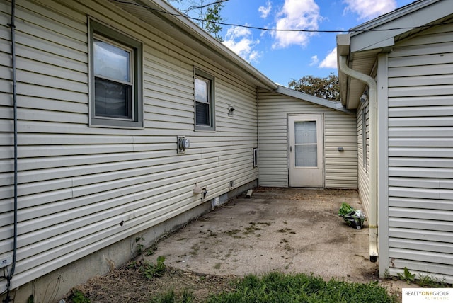12180 Pedersen Dr, Omaha, NE 68144 - view of side of property with a patio