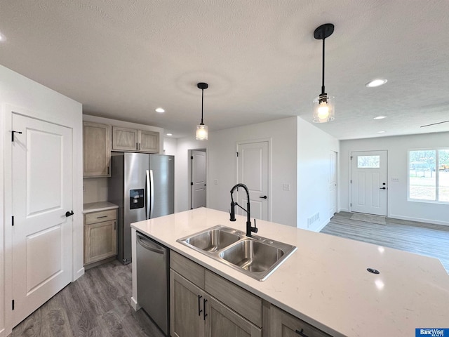 929 S Columbia Ave, Seward, NE 68434 - kitchen with stainless steel appliances, dark wood-style flooring, a sink, light countertops, and recessed lighting