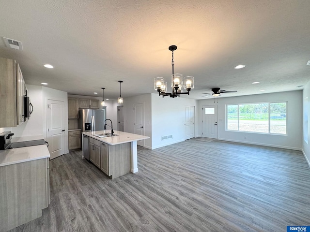 929 S Columbia Ave, Seward, NE 68434 - kitchen with stainless steel appliances, baseboards, light wood-type flooring, recessed lighting, and a ceiling fan