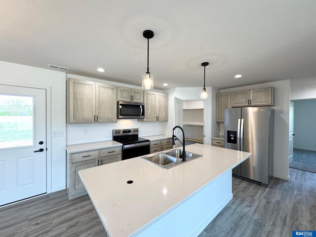 929 S Columbia Ave, Seward, NE 68434 - kitchen featuring appliances with stainless steel finishes, a sink, wood finished floors, recessed lighting, and light countertops