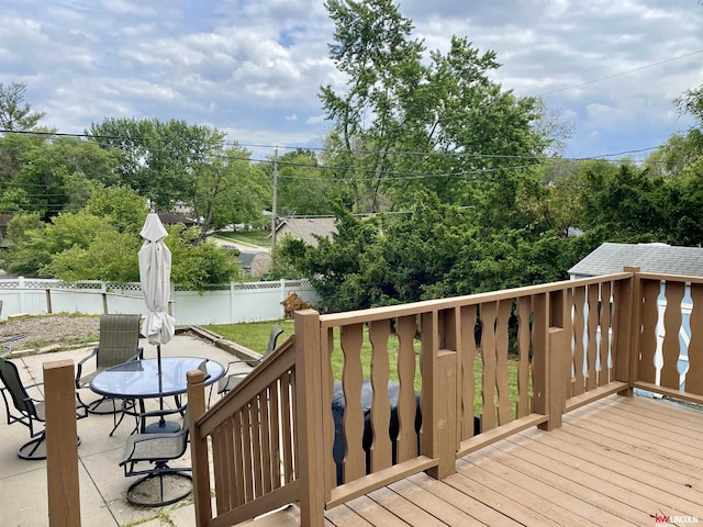 1501 Mildred Ave, Bellevue, NE 68005 - deck featuring a fenced backyard, a patio, and outdoor dining area