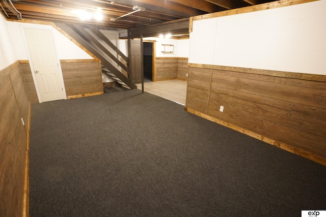 5433 N 45th Ave, Omaha, NE 68104 - finished basement featuring stairs, wainscoting, wooden walls, and carpet flooring