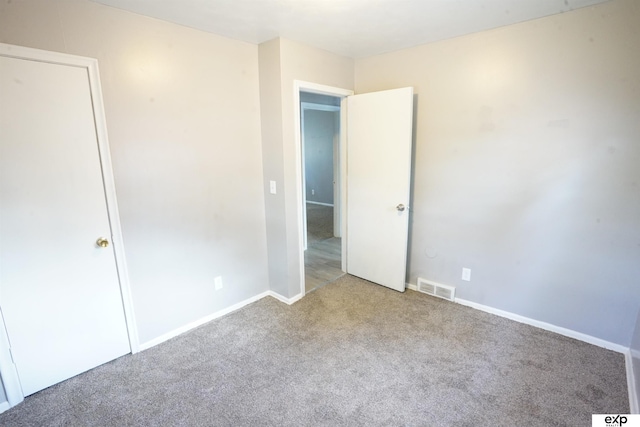 5433 N 45th Ave, Omaha, NE 68104 - unfurnished bedroom with carpet floors and baseboards