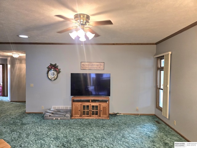 2205 Hidden Canyon Rd, Plattsmouth, NE 68048 - unfurnished living room with carpet flooring, a ceiling fan, crown molding, baseboards, and a textured ceiling