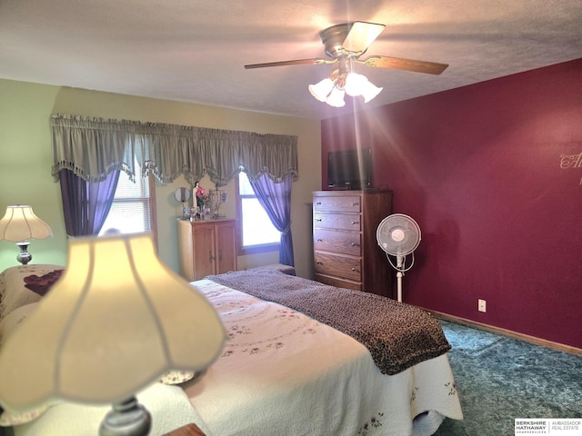 2205 Hidden Canyon Rd, Plattsmouth, NE 68048 - bedroom with carpet flooring, a ceiling fan, and baseboards