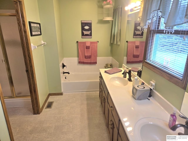 2205 Hidden Canyon Rd, Plattsmouth, NE 68048 - bathroom with a bath, double vanity, and a shower stall