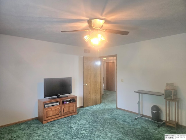 2205 Hidden Canyon Rd, Plattsmouth, NE 68048 - unfurnished living room with ceiling fan, carpet flooring, and baseboards