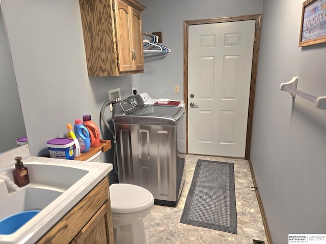 2205 Hidden Canyon Rd, Plattsmouth, NE 68048 - washroom with separate washer and dryer and a sink