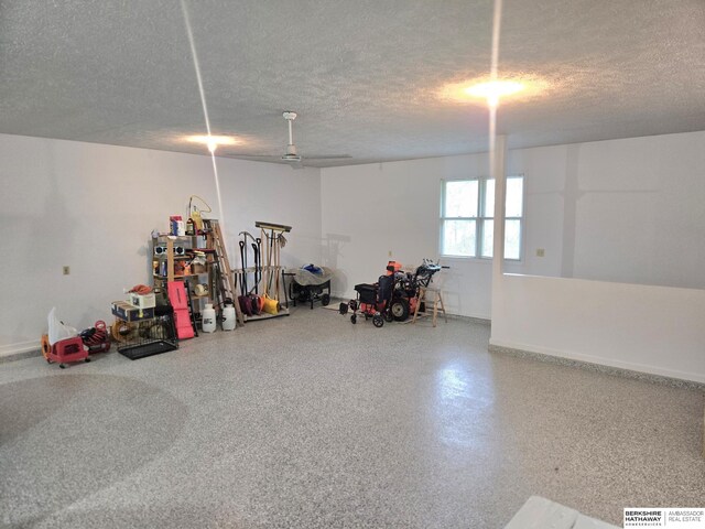 2205 Hidden Canyon Rd, Plattsmouth, NE 68048 - garage featuring baseboards