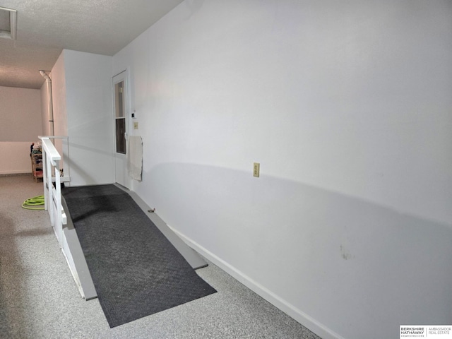 2205 Hidden Canyon Rd, Plattsmouth, NE 68048 - hall featuring baseboards, attic access, and a textured ceiling