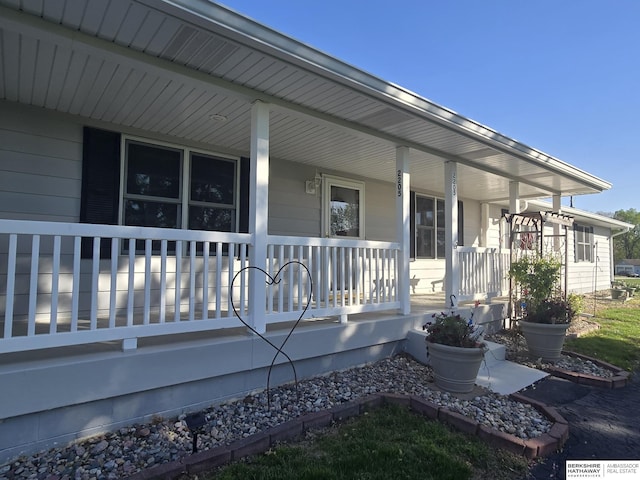 2205 Hidden Canyon Rd, Plattsmouth, NE 68048 - doorway to property featuring a porch