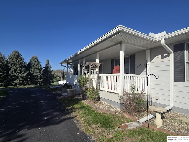 2205 Hidden Canyon Rd, Plattsmouth, NE 68048 - view of side of property with a porch