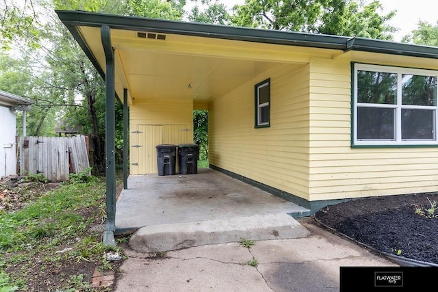 4518 Redick Ave, Omaha, NE 68152 - view of car parking featuring an attached carport and driveway
