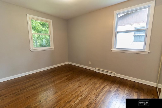 4518 Redick Ave, Omaha, NE 68152 - unfurnished room with baseboards and dark wood-style floors
