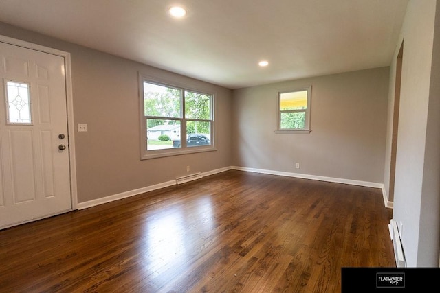 4518 Redick Ave, Omaha, NE 68152 - foyer with dark wood-style floors, a baseboard radiator, baseboards, and recessed lighting