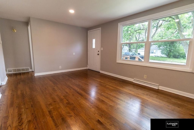 4518 Redick Ave, Omaha, NE 68152 - foyer entrance with plenty of natural light, baseboards, dark wood-style floors, and recessed lighting