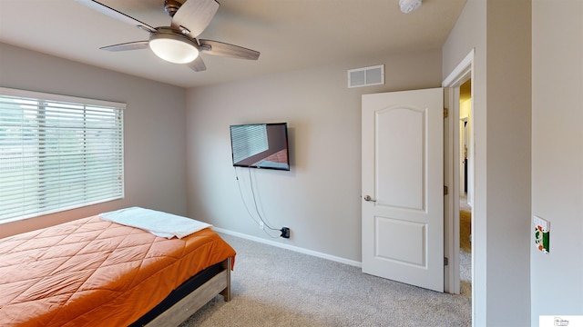 1609 N 208th St, Elkhorn, NE 68022 - carpeted bedroom featuring baseboards and ceiling fan