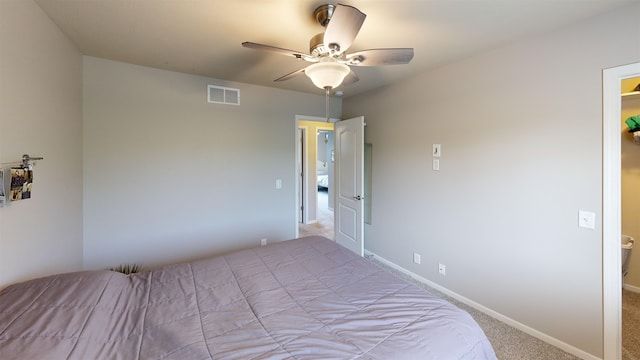 1609 N 208th St, Elkhorn, NE 68022 - bedroom with light carpet, baseboards, and a ceiling fan