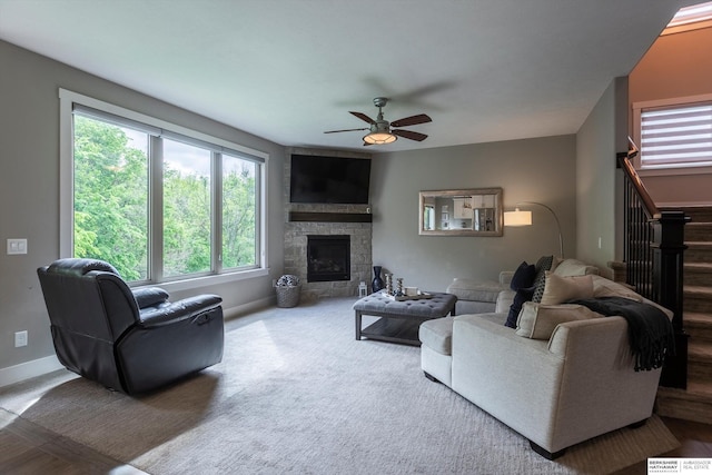 2203 N 188th Ave, Elkhorn, NE 68022 - living room with a ceiling fan, stairway, a stone fireplace, and baseboards