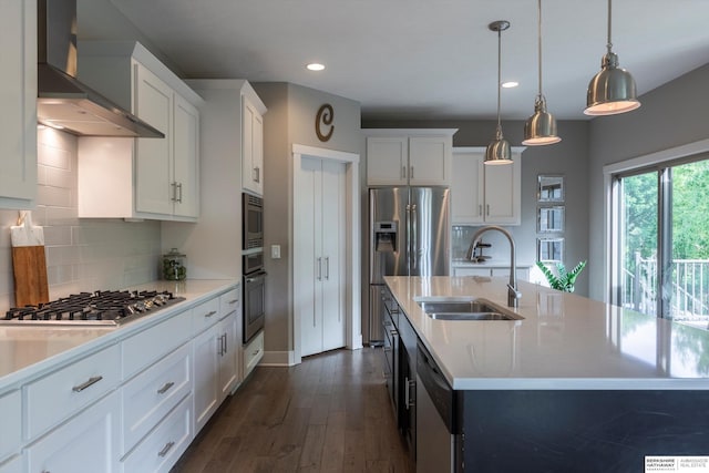 2203 N 188th Ave, Elkhorn, NE 68022 - kitchen with wall chimney range hood, appliances with stainless steel finishes, a sink, light countertops, and white cabinets