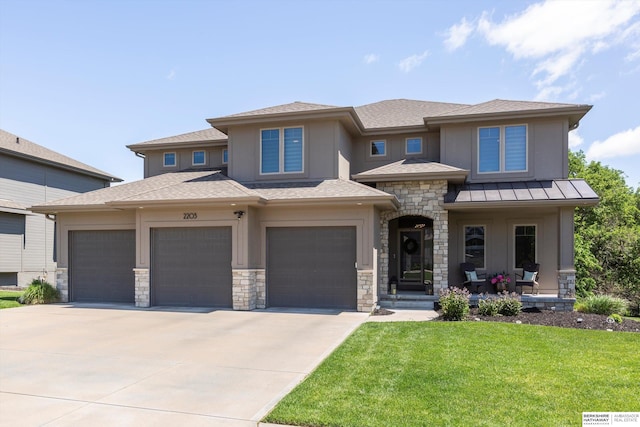 2203 N 188th Ave, Elkhorn, NE 68022 - prairie-style home with concrete driveway, stone siding, a front yard, covered porch, and stucco siding
