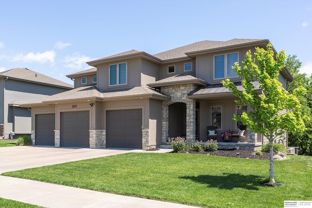 2203 N 188th Ave, Elkhorn, NE 68022 - prairie-style home with stone siding, driveway, a front lawn, stucco siding, and a porch