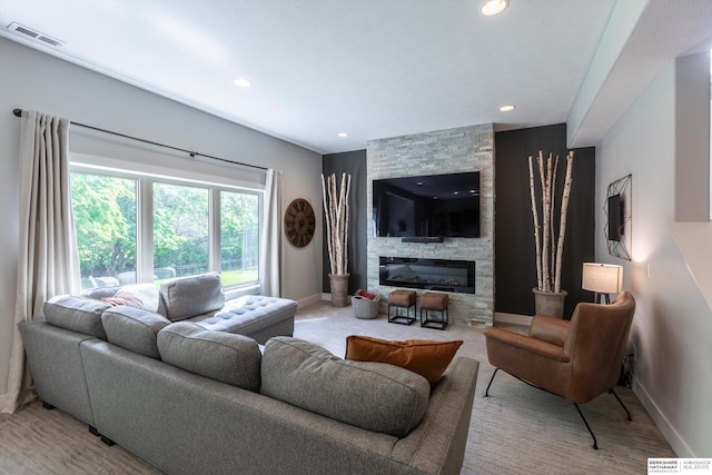2203 N 188th Ave, Elkhorn, NE 68022 - living room with baseboards, a stone fireplace, recessed lighting, and light carpet