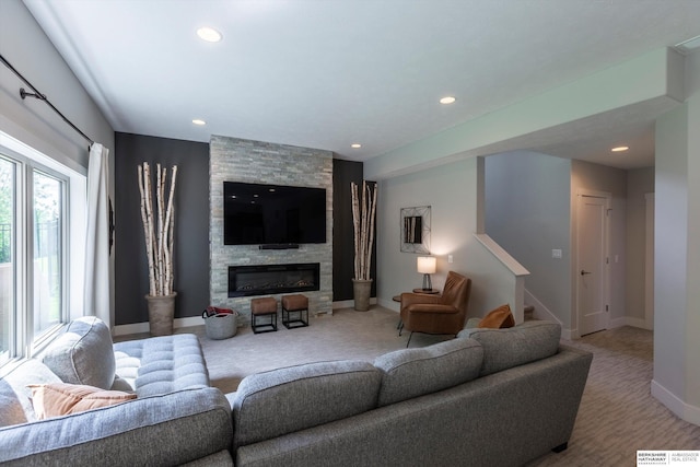 2203 N 188th Ave, Elkhorn, NE 68022 - living area with a stone fireplace, recessed lighting, baseboards, and stairway