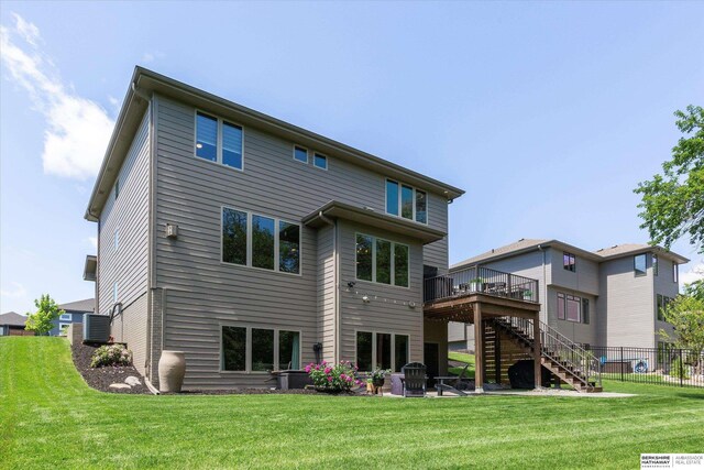 2203 N 188th Ave, Elkhorn, NE 68022 - rear view of house with stairway, central AC unit, a deck, and a patio area