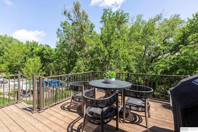 2203 N 188th Ave, Elkhorn, NE 68022 - wooden terrace with a grill and outdoor dining area