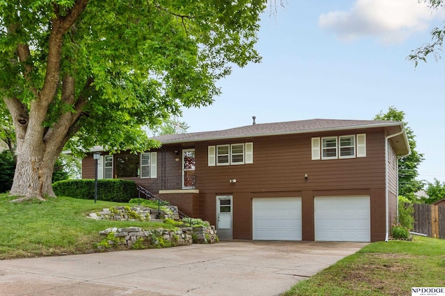 3129 S 118th St, Omaha, NE 68144 - view of front of home featuring an attached garage and driveway