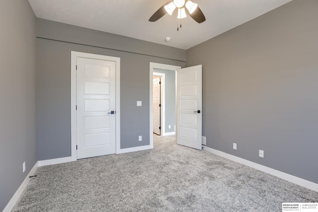 3938 S 207th St, Elkhorn, NE 68022 - unfurnished bedroom featuring carpet, baseboards, and a ceiling fan