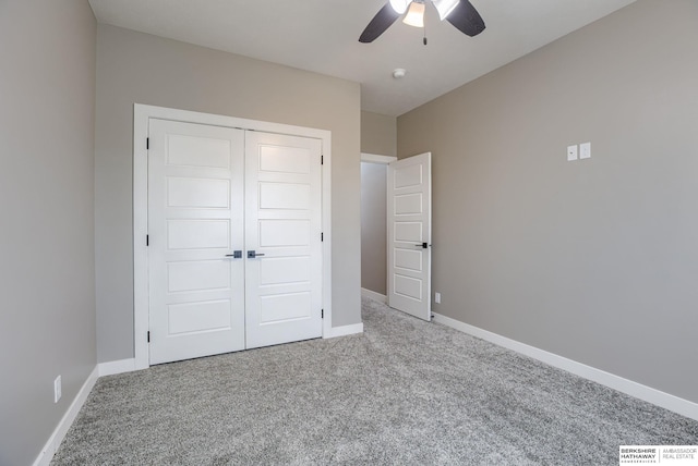 3938 S 207th St, Elkhorn, NE 68022 - unfurnished bedroom with carpet floors, a closet, baseboards, and ceiling fan