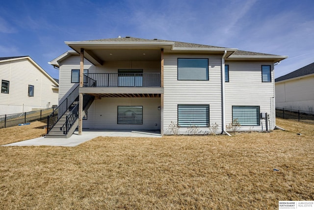 3938 S 207th St, Elkhorn, NE 68022 - back of property with a patio, stairs, roof with shingles, and a balcony