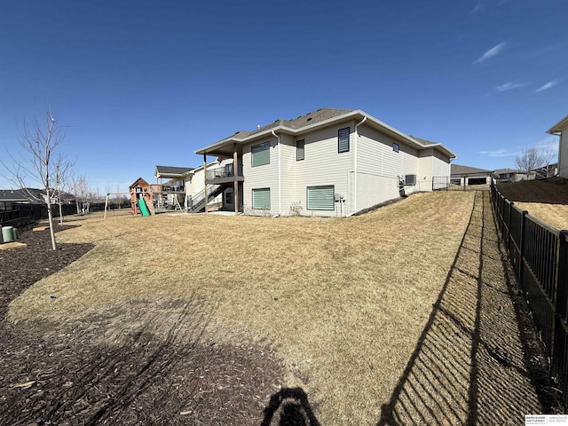 3938 S 207th St, Elkhorn, NE 68022 - rear view of property with a fenced backyard