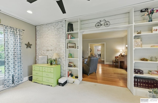 5119 Hamilton St, Omaha, NE 68132 - sitting room featuring ceiling fan, wood finished floors, and baseboards