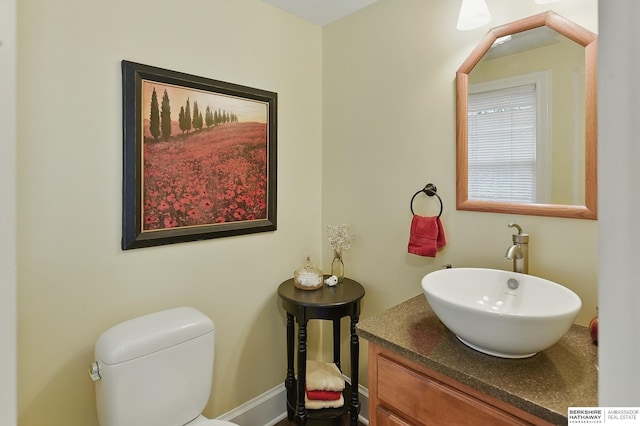 5119 Hamilton St, Omaha, NE 68132 - half bath with vanity, toilet, and baseboards