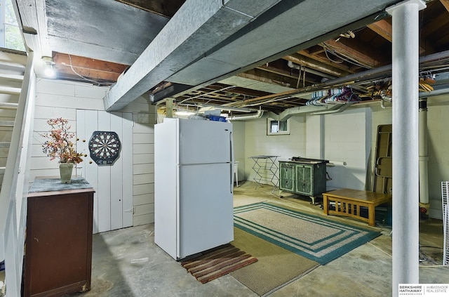 5119 Hamilton St, Omaha, NE 68132 - unfinished basement with freestanding refrigerator and concrete block wall