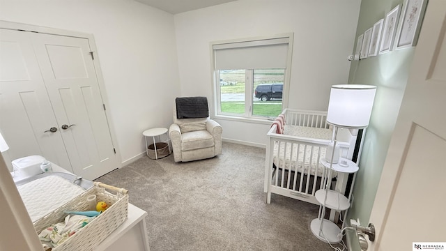 12667 161st Ave, Bennington, NE 68007 - bedroom with carpet, a crib, and baseboards