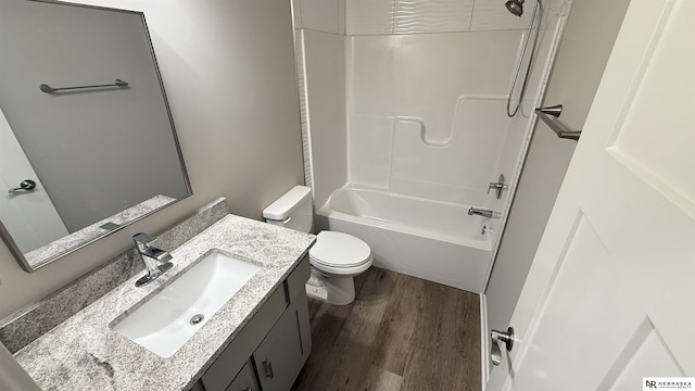 12667 161st Ave, Bennington, NE 68007 - full bath featuring wood finished floors, toilet, vanity, and bathtub / shower combination