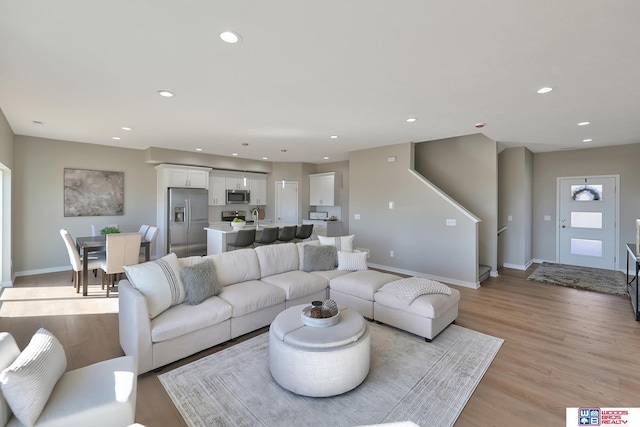 350 N 105th St, Lincoln, NE 68527 - living area with light wood-style floors, recessed lighting, and baseboards