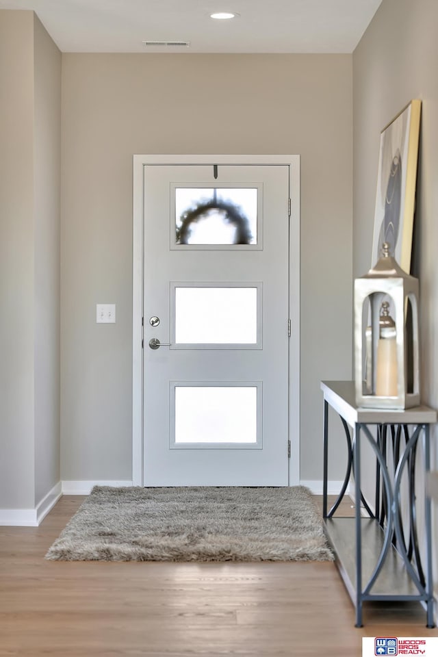 350 N 105th St, Lincoln, NE 68527 - foyer featuring wood finished floors and baseboards