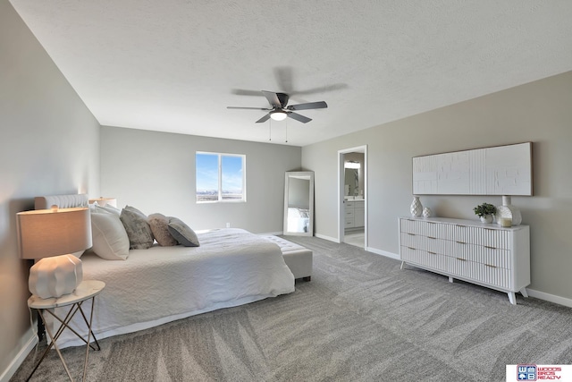 350 N 105th St, Lincoln, NE 68527 - carpeted bedroom with baseboards, connected bathroom, a ceiling fan, and a textured ceiling