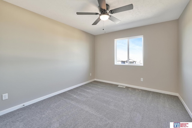350 N 105th St, Lincoln, NE 68527 - unfurnished room with ceiling fan, dark carpet, and baseboards