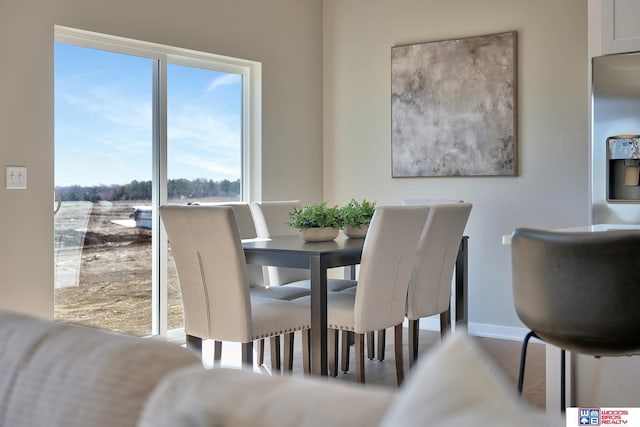350 N 105th St, Lincoln, NE 68527 - dining room featuring healthy amount of natural light and baseboards