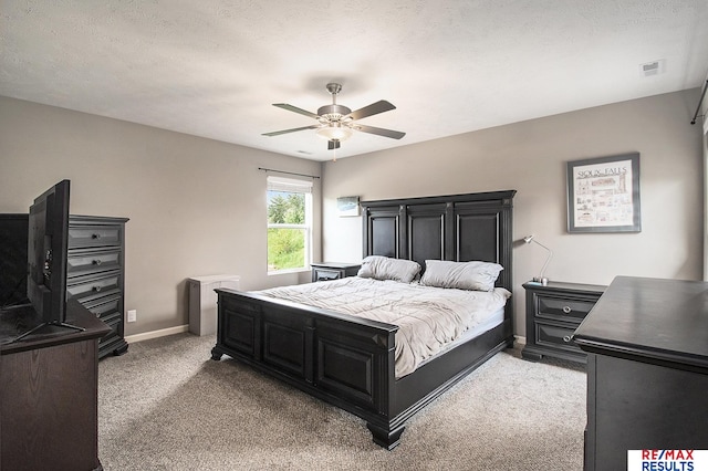 10202 N 152nd Ave, Bennington, NE 68007 - bedroom with light colored carpet, baseboards, and a ceiling fan