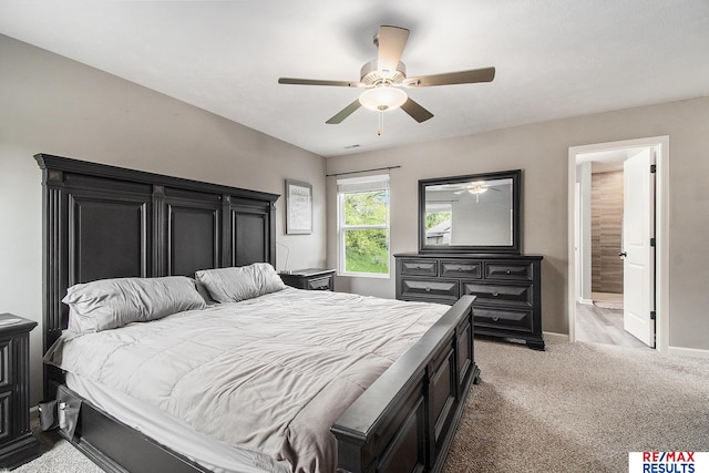10202 N 152nd Ave, Bennington, NE 68007 - bedroom with light carpet, baseboards, and ceiling fan